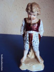 Antiquitäten: (CE-41)PRECIOSO BISCUIT ESMALTADO SIGLO XIX - NIÑO CON PIPA - NUMERADO
